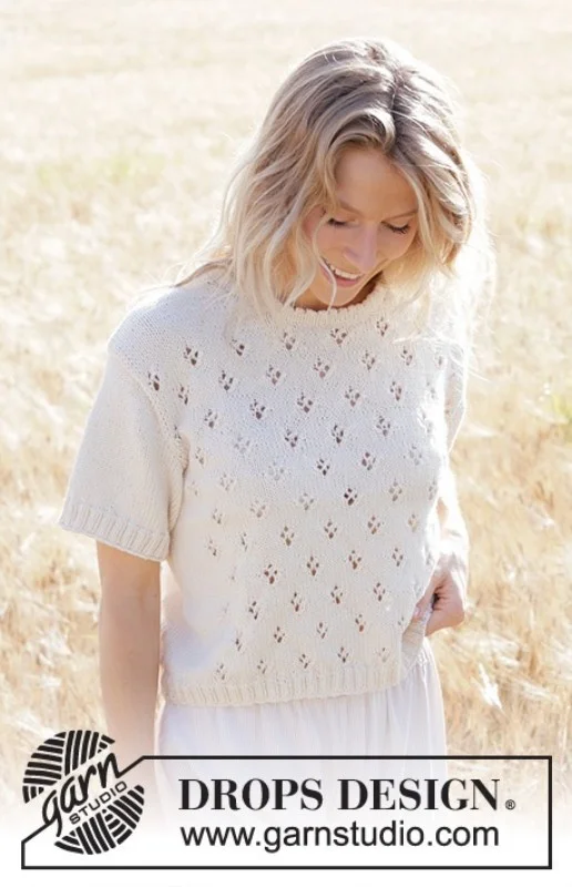 Trygg betalning "White Spring" stickad i Drops Cotton Merino 250-7