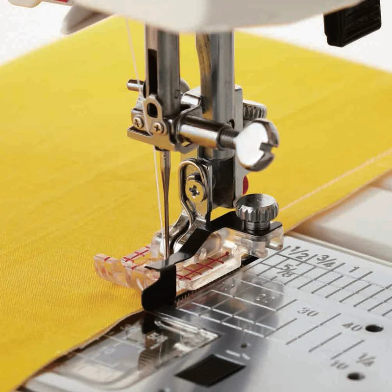 Quilt- och lapptekniksfot 3-i-1 Janome Nyhet