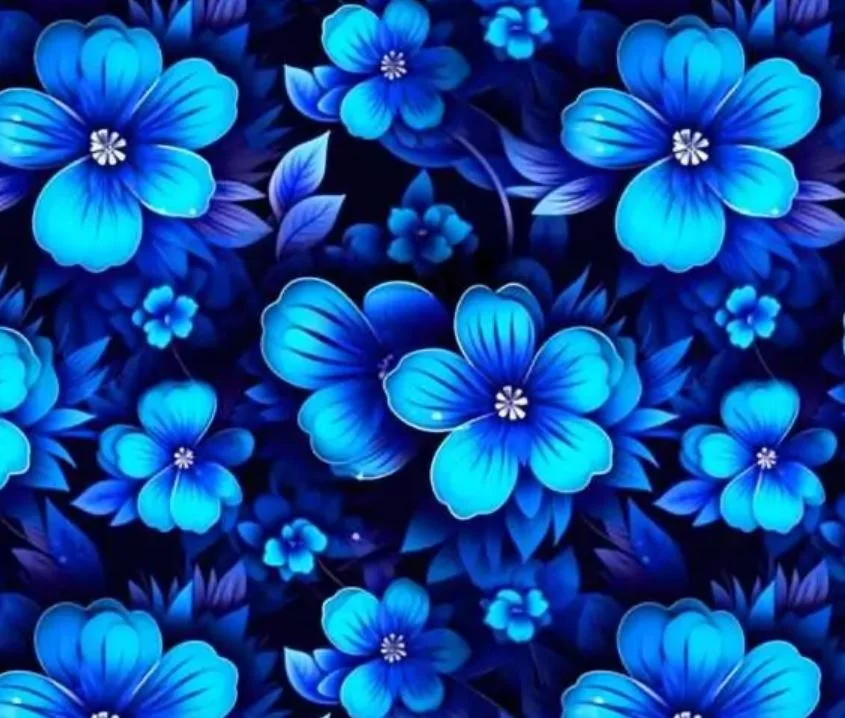 Sänkt pris Trikå glödande blå blommor, GOTS ekologisk bomull